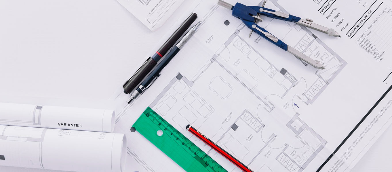 Livic engineer reviewing architectural drawings in Hyderabad office